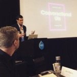 Thomas Prommer delivering keynote presentation at tech conference