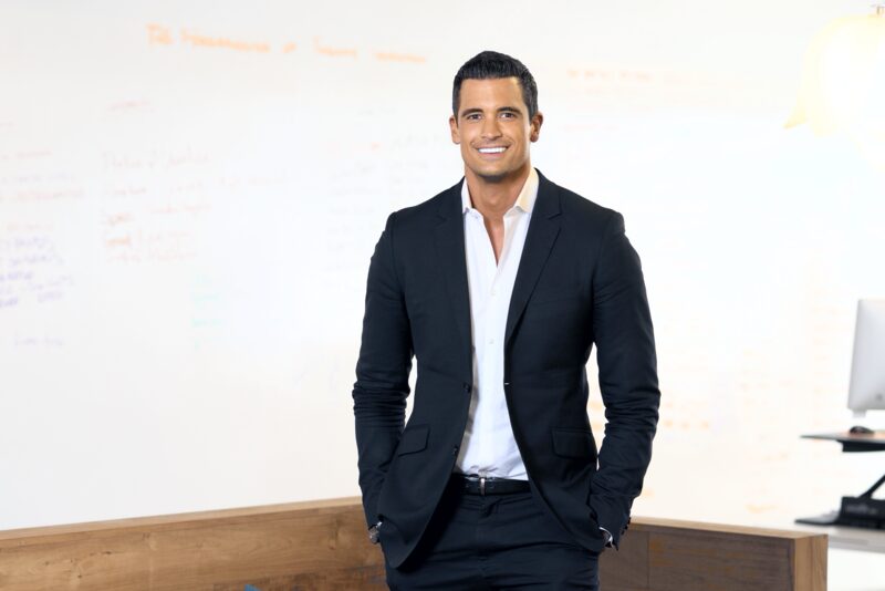 Thomas Prommer standing by a whiteboard in an office