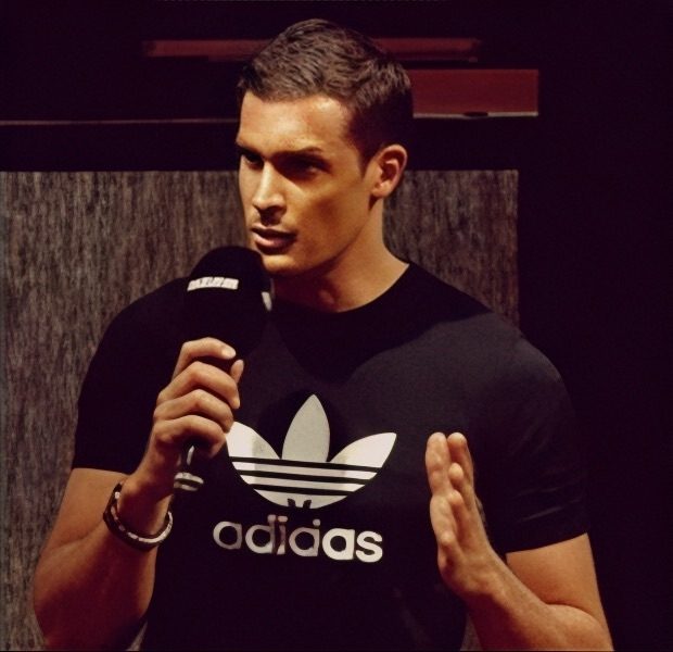 Thomas Prommer speaking at an Adidas event